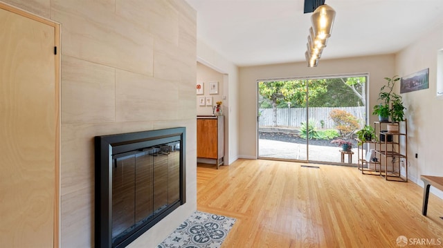29 Woodcrest Cir, Oakland, CA 94602 - unfurnished living room featuring wood finished floors and a fireplace