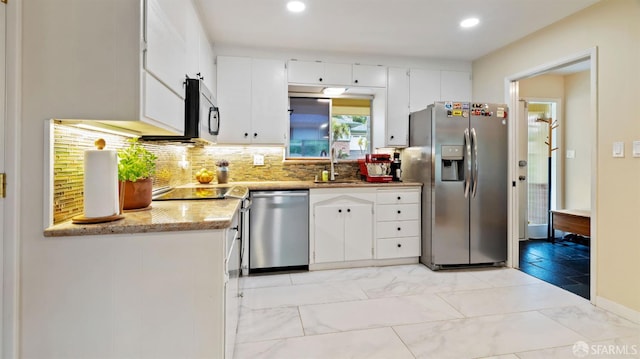 29 Woodcrest Cir, Oakland, CA 94602 - kitchen featuring appliances with stainless steel finishes, white cabinetry, decorative backsplash, recessed lighting, and light marble finish flooring