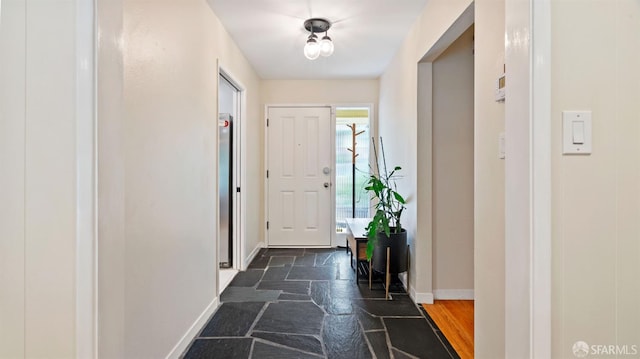 29 Woodcrest Cir, Oakland, CA 94602 - foyer with baseboards and stone tile flooring