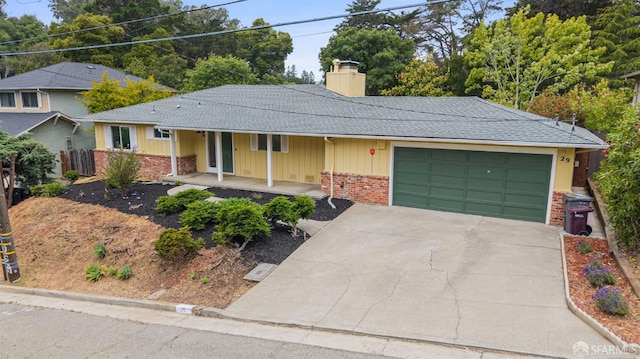 29 Woodcrest Cir, Oakland, CA 94602 - single story home featuring brick siding, a garage, a chimney, driveway, and a porch
