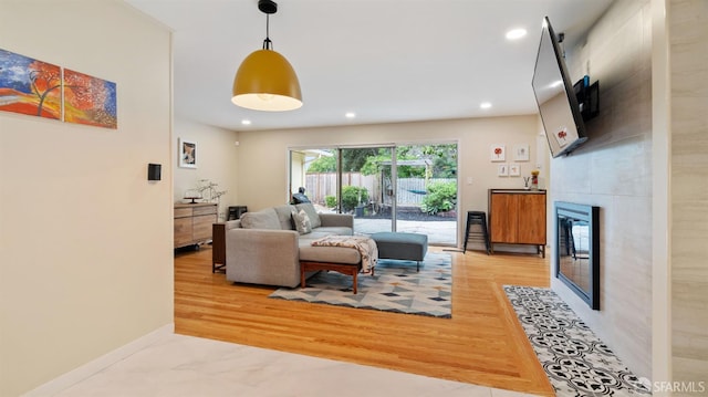 29 Woodcrest Cir, Oakland, CA 94602 - living area featuring a tile fireplace, recessed lighting, and wood finished floors