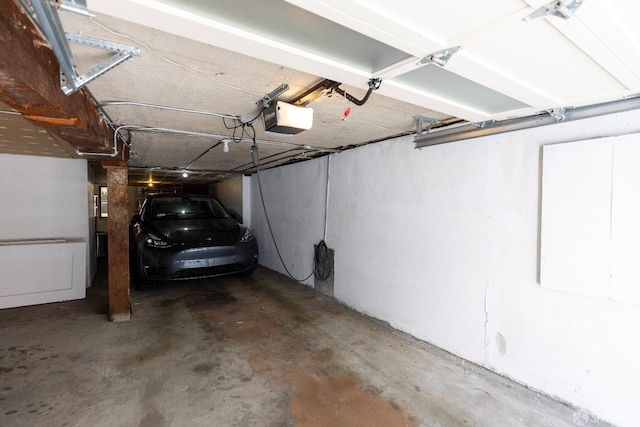 garage featuring a garage door opener