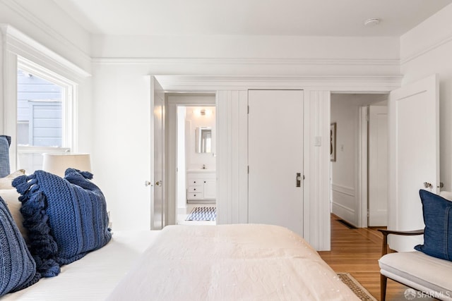 276 Funston Ave, San Francisco, CA 94118 - bedroom with wood finished floors and ensuite bath