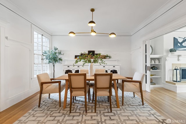 276 Funston Ave, San Francisco, CA 94118 - dining area featuring light wood-style flooring and crown molding