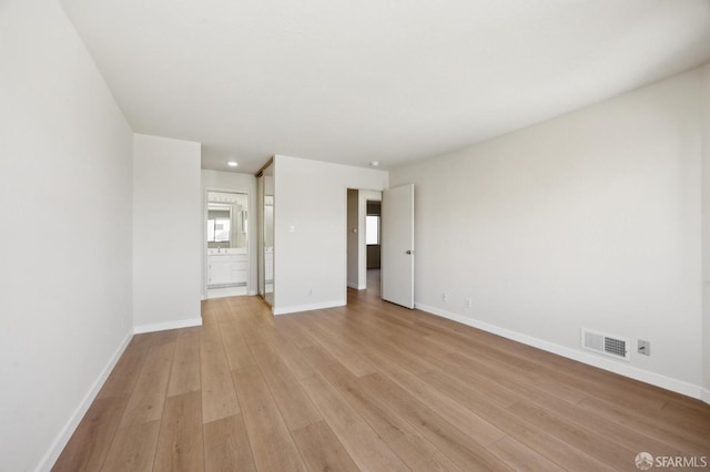 empty room featuring light wood-type flooring