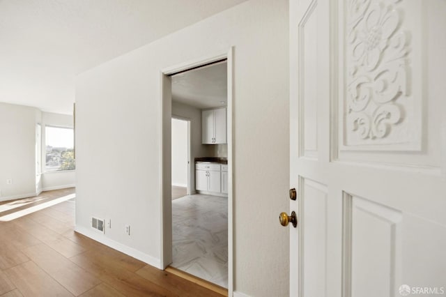 hall featuring hardwood / wood-style floors