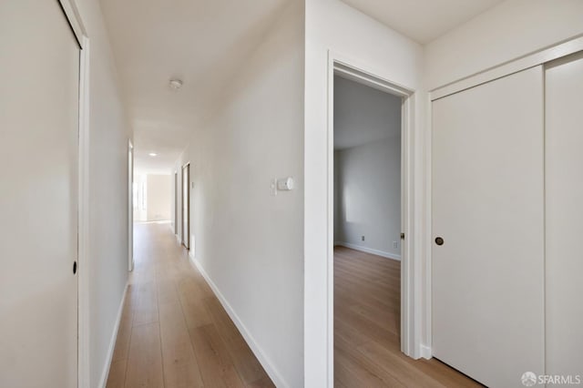 hallway featuring light wood-type flooring