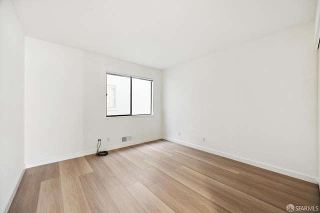 empty room featuring light wood-type flooring