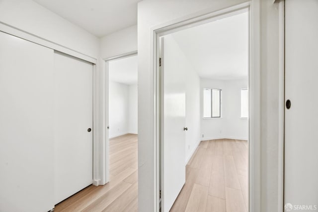 hallway featuring light hardwood / wood-style floors