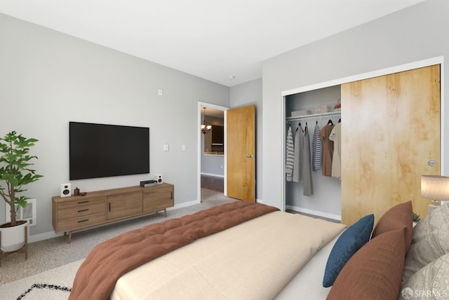 5800 3rd St Unit 1401, San Francisco, CA 94124 - carpeted bedroom featuring a closet and baseboards