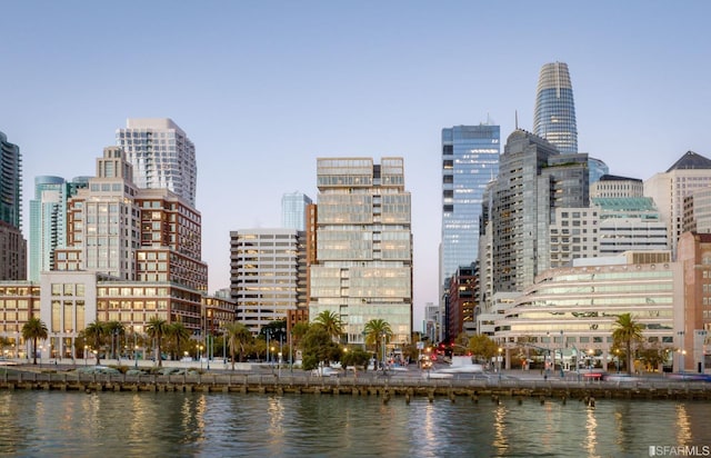 property's view of city featuring a water view