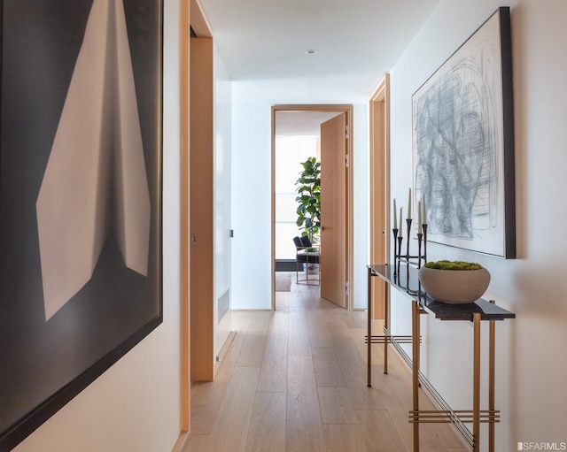 hallway featuring light wood-type flooring