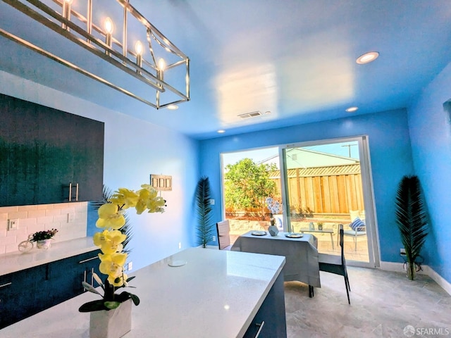 office with an inviting chandelier, visible vents, and recessed lighting