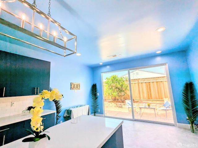 interior space with concrete floors, visible vents, recessed lighting, and access to outside