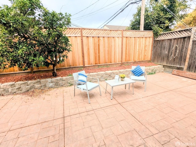 view of patio with a fenced backyard