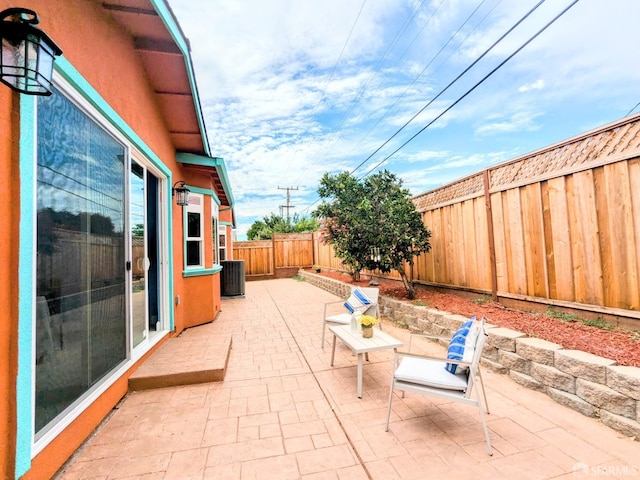 view of patio featuring cooling unit