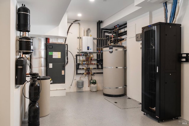 utilities with tankless water heater, strapped water heater, and heating unit