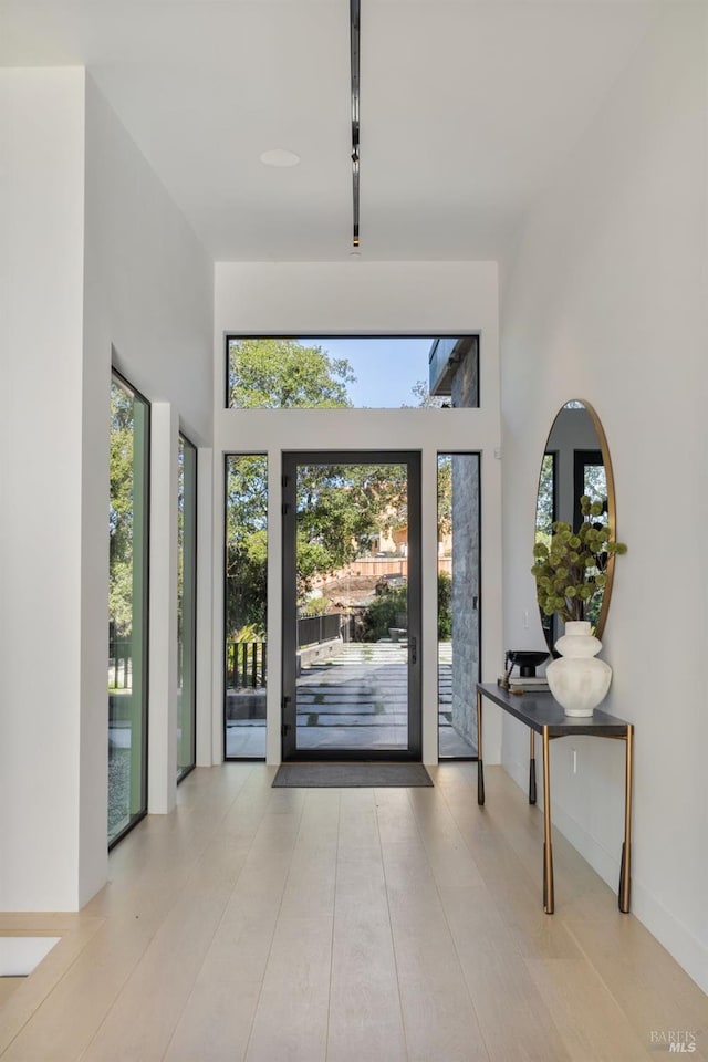 entryway with a high ceiling