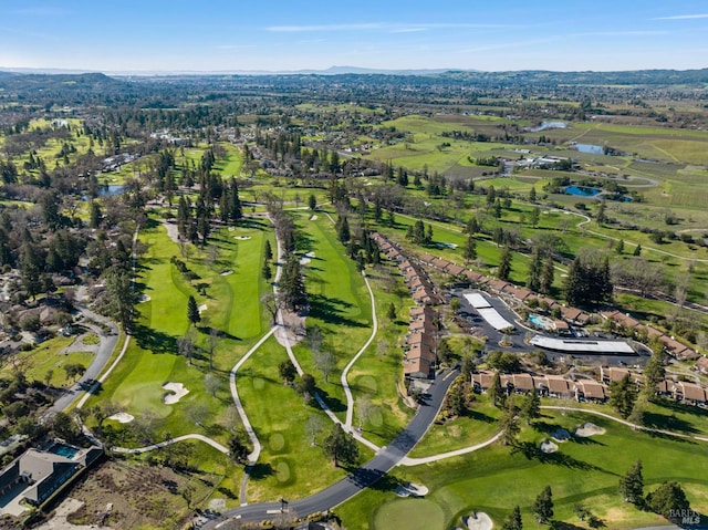 birds eye view of property with golf course view