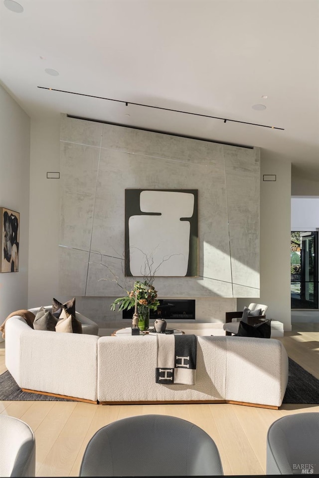 living area with wood finished floors