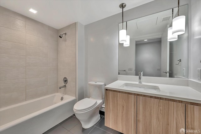 full bathroom with vanity, toilet, tile patterned floors, and tiled shower / bath