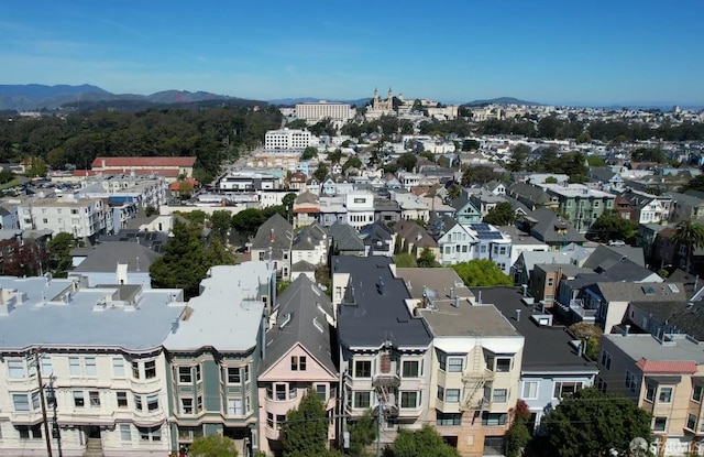 aerial perspective of suburban area with a mountain backdrop