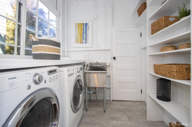 laundry area featuring washing machine and dryer