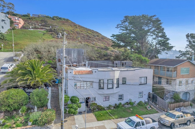 exterior space featuring a mountain view