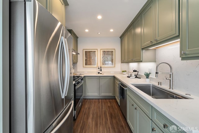 955 Ridgeview Ct Unit C, South San Francisco, CA 94080 - kitchen with appliances with stainless steel finishes, green cabinets, dark wood-type flooring, recessed lighting, and light stone counters
