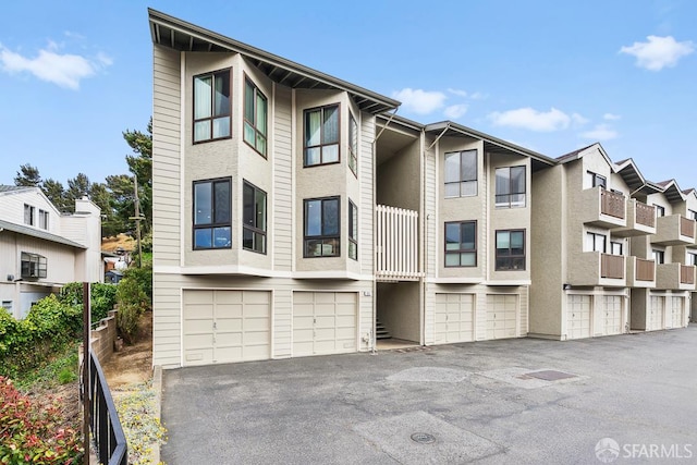 955 Ridgeview Ct Unit C, South San Francisco, CA 94080 - view of property with an attached garage and driveway