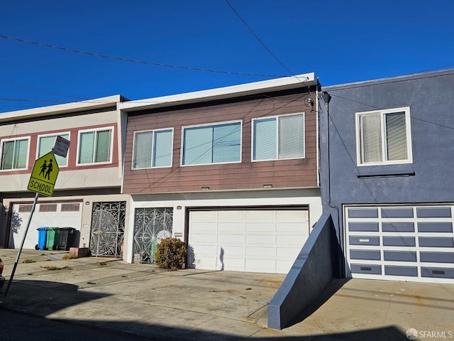 view of front of home with a garage