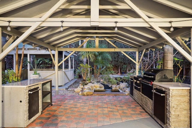 view of patio with a gazebo and area for grilling