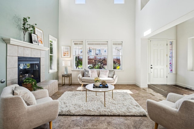 living room featuring carpet floors, plenty of natural light, and a fireplace