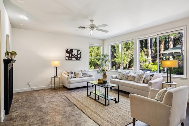 carpeted living room featuring ceiling fan