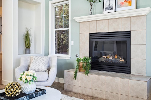 interior details with a tiled fireplace