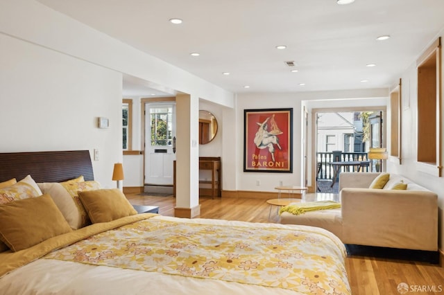 bedroom featuring light hardwood / wood-style floors