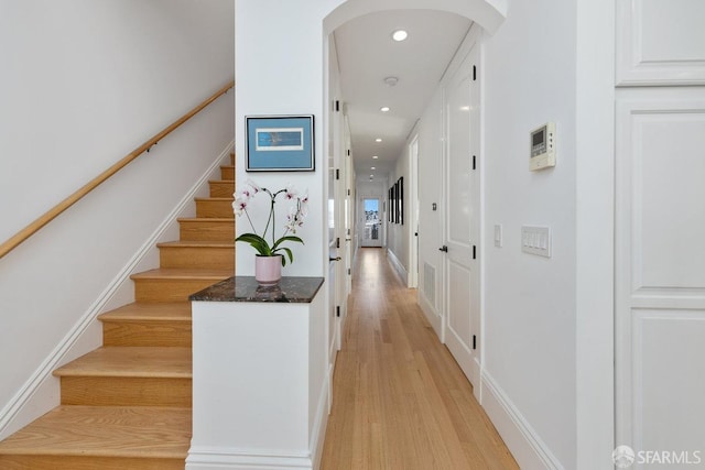 hallway with light wood-type flooring