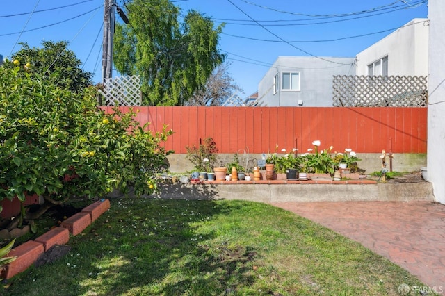 view of yard featuring fence