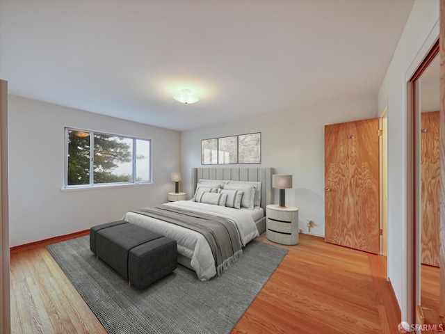 bedroom featuring light wood-type flooring