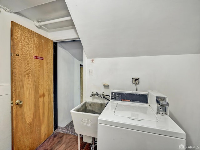 laundry area with washer / dryer and sink