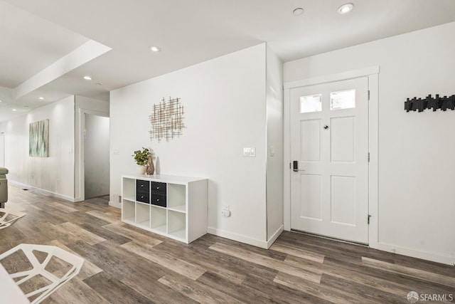 entrance foyer with recessed lighting, baseboards, and wood finished floors