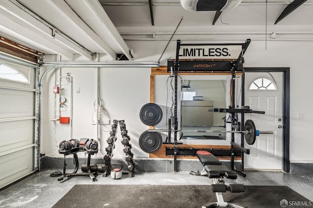 exercise room featuring a garage