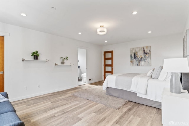 bedroom with baseboards, recessed lighting, ensuite bathroom, and light wood-style floors