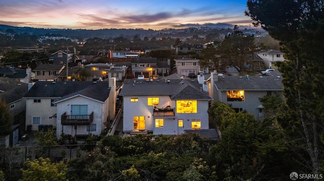 aerial view at dusk with a residential view