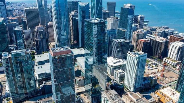 property's view of city featuring a water view