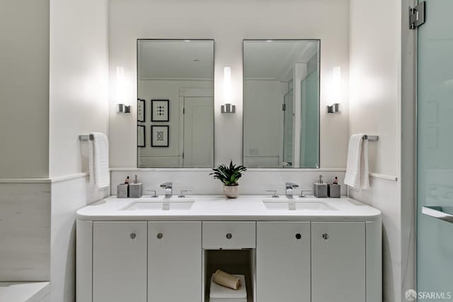 bathroom featuring vanity and walk in shower