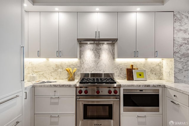 kitchen with stainless steel appliances and white cabinetry