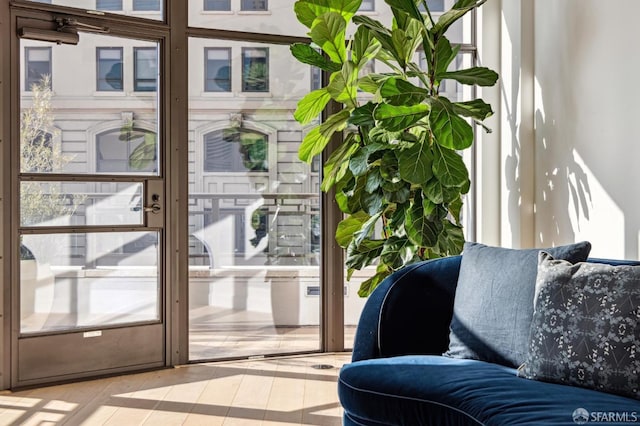 doorway to outside featuring light tile patterned floors