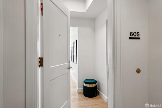 corridor featuring light hardwood / wood-style flooring