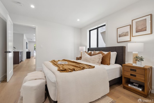 867 33rd Ave, San Francisco, CA 94121 - bedroom with light wood-style floors, recessed lighting, and baseboards